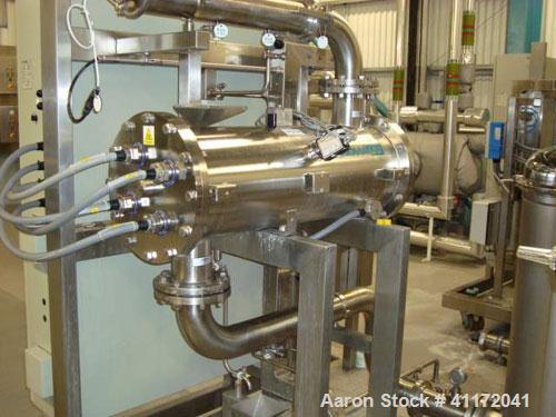 Used Vivendi Purified Water Softener Skids consisting of: (1) Forbes approximately 10,000 litre HDPE tank, (2) Grunfoss type CRNE45-2, 45cumt/hr pumps, (1) Elga model 611530AA40C1EE filter, (1) Bibby...
