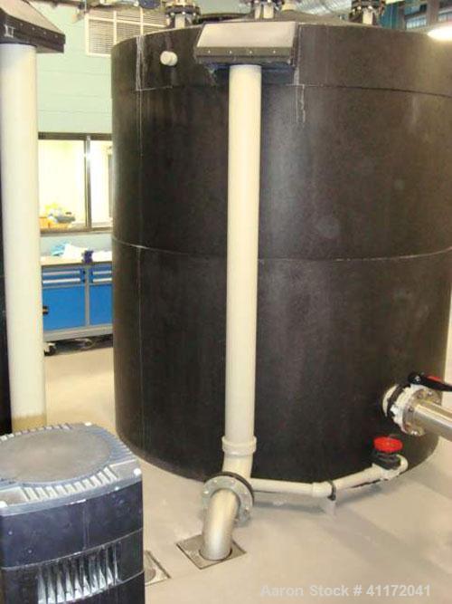 Used Vivendi Purified Water Softener Skids consisting of: (1) Forbes approximately 10,000 litre HDPE tank, (2) Grunfoss type CRNE45-2, 45cumt/hr pumps, (1) Elga model 611530AA40C1EE filter, (1) Bibby...