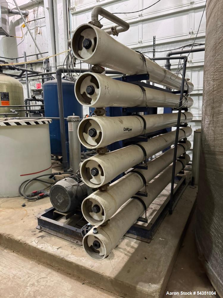 Used U.S. Filter Reverse Osmosis Open Skid Unit, Model 67/FM3-18,  75 GPM capacity.   Includes T&T Pump Co Pump Model 612, Driven by a 30hp 3/60/230/460v 3560rpm motor. Mounted control panel with (2)...