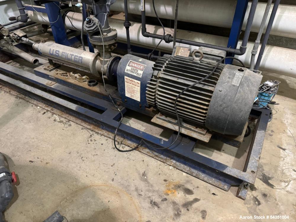 Used U.S. Filter Reverse Osmosis Open Skid Unit, Model 67/FM3-18,  75 GPM capacity.   Includes T&T Pump Co Pump Model 612, Driven by a 30hp 3/60/230/460v 3560rpm motor. Mounted control panel with (2)...