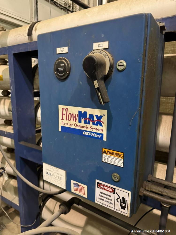 Used U.S. Filter Reverse Osmosis Open Skid Unit, Model 67/FM3-18,  75 GPM capacity.   Includes T&T Pump Co Pump Model 612, Driven by a 30hp 3/60/230/460v 3560rpm motor. Mounted control panel with (2)...