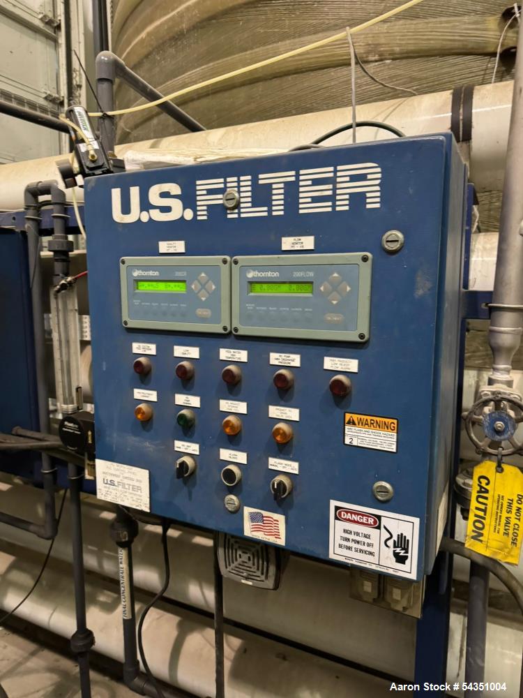 Used U.S. Filter Reverse Osmosis Open Skid Unit, Model 67/FM3-18,  75 GPM capacity.   Includes T&T Pump Co Pump Model 612, Driven by a 30hp 3/60/230/460v 3560rpm motor. Mounted control panel with (2)...