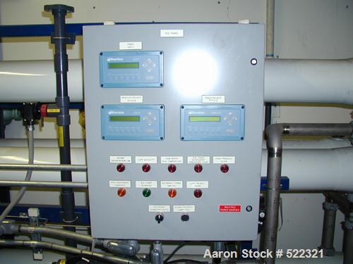 Unused- US Filter Reverse Osmosis System CF-1, Model T942530-00, Type 24FM04A-3F-IP. Two tank carbon filter system, two tank multimedia unit, two tank water softener, five tube RO unit with control p...
