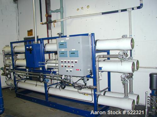 Unused- US Filter Reverse Osmosis System CF-1, Model T942530-00, Type 24FM04A-3F-IP. Two tank carbon filter system, two tank multimedia unit, two tank water softener, five tube RO unit with control p...