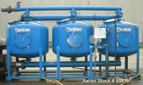 USED: Yardney high rate sand media filter system, model IL4824-3A, carbon steel. (3) 48" diameter x 24" tall epoxy coated carbon steel tanks, rated 80 psi. Approximate 37.80 square foot filter area. ...