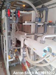 Used GE E8 Series 60 Hz Reverse Osmosis Machine, Model E8-67K-DLX, 460,6. Packaged in a 40 foot Logan triaxle gooseneck trai...