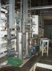 Used Zenon Environmental Inc Reverse Osmosis System. 250 psi operating pressure at 35 deg C, perm rate 240 USGPM, 11 tubes are 9
