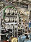 Unused- Reverse Osmosis Filtration System. 9500 liter/hour capacity. 2205 square meters total membrane area. System consisting of: (18) filters; 316 SS CIP tank; (2) 3500 RPM CIP pumps; Goulds booste...
