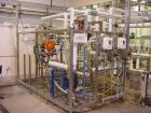 Used APV Invensys 5 Gallons Per Minute Continuous Media Sterilization System. Includes 5 minute hold loop, 50 gallon balance tank, APV plate heat exchanger, APV steam injector with tri-clamps, magnet...