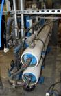 Used Culligan G Series Dual Membrane Reverse Osmosis System. Consisting of: (2) Culligan Model C-300P-8 membrane pressure vessels, (1) Grundfos vertical pump, (1) cartridge filter housing, (1) XP con...