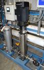 Used Culligan G Series Dual Membrane Reverse Osmosis System. Consisting of: (2) Culligan Model C-300P-8 membrane pressure vessels, (1) Grundfos vertical pump, (1) cartridge filter housing, (1) XP con...