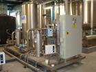 Used Vivendi Purified Water Softener Skids consisting of: (1) Forbes approximately 10,000 litre HDPE tank, (2) Grunfoss type CRNE45-2, 45cumt/hr pumps, (1) Elga model 611530AA40C1EE filter, (1) Bibby...