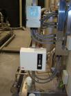 Used Vivendi Purified Water Softener Skids consisting of: (1) Forbes approximately 10,000 litre HDPE tank, (2) Grunfoss type CRNE45-2, 45cumt/hr pumps, (1) Elga model 611530AA40C1EE filter, (1) Bibby...