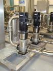 Used Vivendi Purified Water Softener Skids consisting of: (1) Forbes approximately 10,000 litre HDPE tank, (2) Grunfoss type CRNE45-2, 45cumt/hr pumps, (1) Elga model 611530AA40C1EE filter, (1) Bibby...