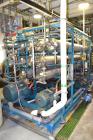 Used Osmonics Reverse Osmosis System, Model 74B-HR43KY/DLX-DP-SP, Serial# 94-K276227A. Inlet pressure before & after prefilter 60/80 psi/12/12 psi, flow (1) concentrate + permeate + recycle 45/30 gal...