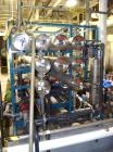 Used Osmonics Reverse Osmosis System, Model 74B-HR43KY/DLX-DP-SP, Serial# 94-K276227A. Inlet pressure before & after prefilter 60/80 psi/12/12 psi, flow (1) concentrate + permeate + recycle 45/30 gal...