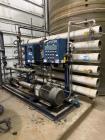 Used U.S. Filter Reverse Osmosis Open Skid Unit, Model 67/FM3-18,  75 GPM capacity.   Includes T&T Pump Co Pump Model 612, Driven by a 30hp 3/60/230/460v 3560rpm motor. Mounted control panel with (2)...
