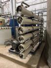 Used U.S. Filter Reverse Osmosis Open Skid Unit, Model 67/FM3-18,  75 GPM capacity.   Includes T&T Pump Co Pump Model 612, Driven by a 30hp 3/60/230/460v 3560rpm motor. Mounted control panel with (2)...