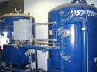 Unused- US Filter Reverse Osmosis System CF-1, Model T942530-00, Type 24FM04A-3F-IP. Two tank carbon filter system, two tank multimedia unit, two tank water softener, five tube RO unit with control p...