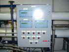 Unused- US Filter Reverse Osmosis System CF-1, Model T942530-00, Type 24FM04A-3F-IP. Two tank carbon filter system, two tank multimedia unit, two tank water softener, five tube RO unit with control p...