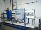 Unused- US Filter Reverse Osmosis System CF-1, Model T942530-00, Type 24FM04A-3F-IP. Two tank carbon filter system, two tank multimedia unit, two tank water softener, five tube RO unit with control p...