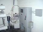 Unused- US Filter Reverse Osmosis System CF-1, Model T942530-00, Type 24FM04A-3F-IP. Two tank carbon filter system, two tank multimedia unit, two tank water softener, five tube RO unit with control p...