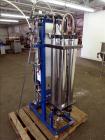 Used US Filter Reverse Osmosis System, Model VROVC03BX. Rated 5760 gallons per day (4 Gallons Per Minute). Unit Consists of (4) Filmtec 4